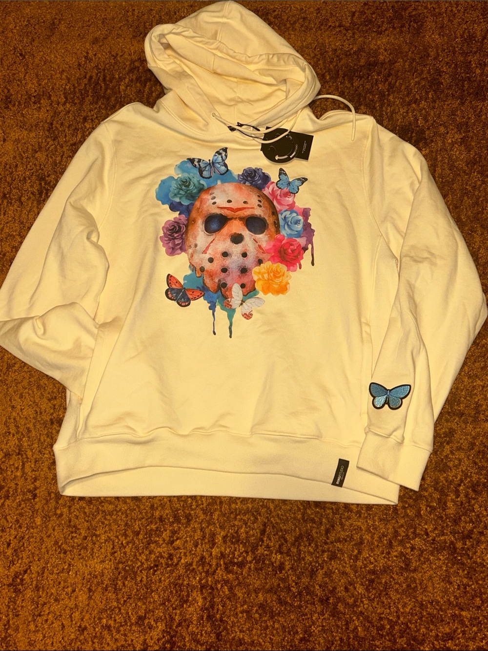 Women’s Cream Hoodie with Floral Mask Graphic